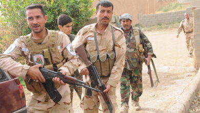 صورة القوات الحكومية والميليشيات تشن حملات دهم وتفتيش في بغداد والأنبار
