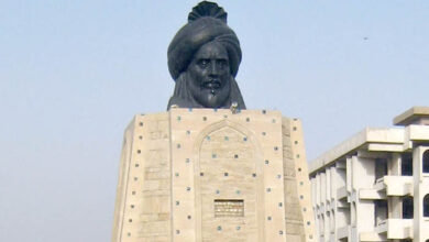 صورة ميليشيات تروج لعبارات مسيئة بحق رموز الأمّة واستعراضات طائفية في بغداد